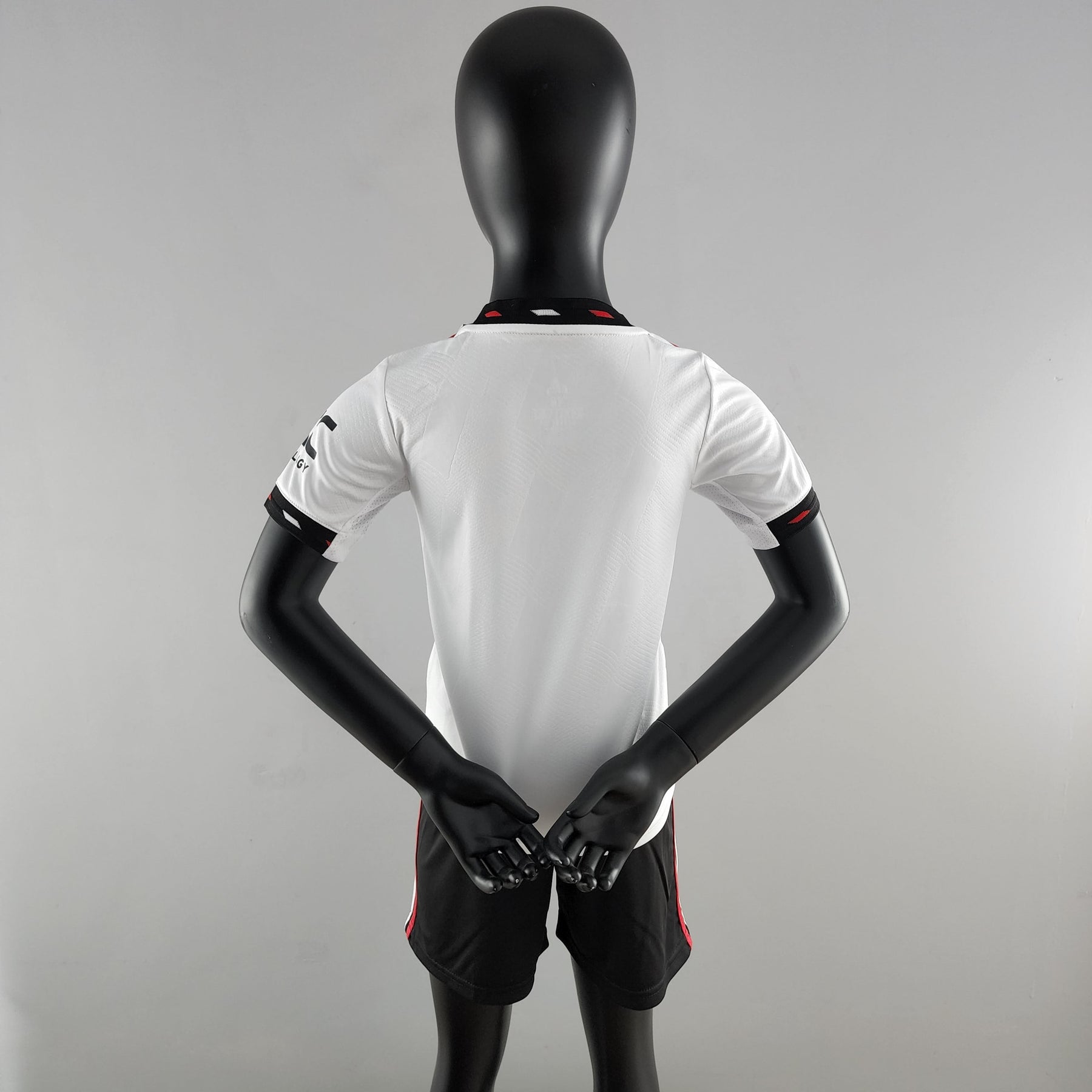 Kit Infantil Manchester United Reserva 22/23